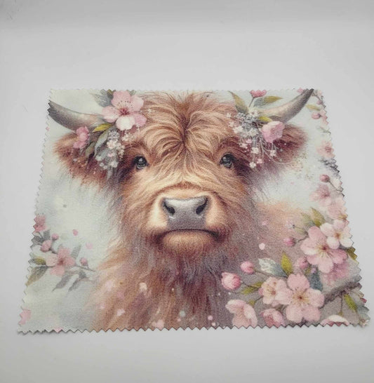 Vache et fleurs